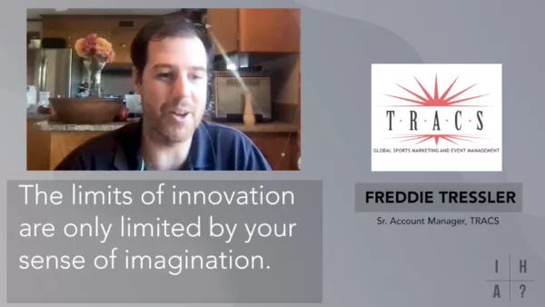 A man talking to a man.